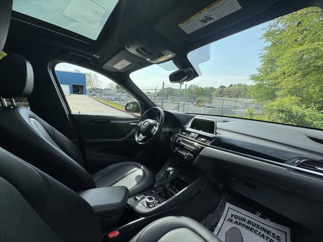 used 2018 BMW X1 car, priced at $13,999