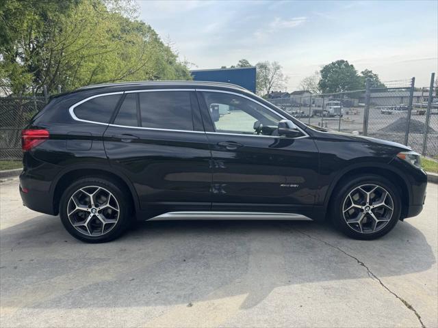 used 2018 BMW X1 car, priced at $13,999
