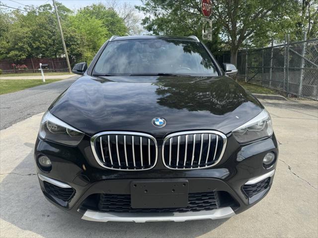 used 2018 BMW X1 car, priced at $13,999