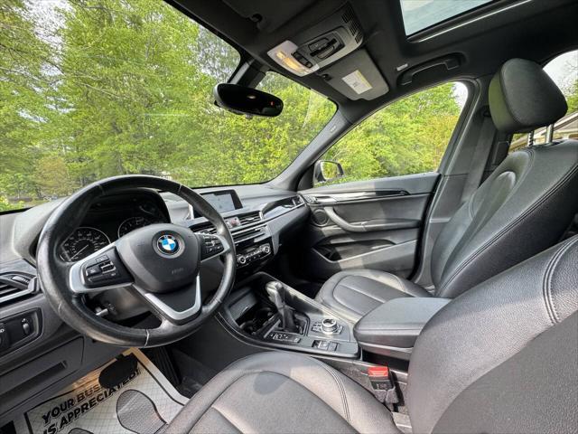 used 2018 BMW X1 car, priced at $13,999