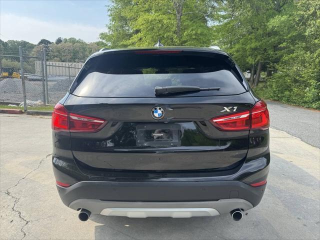 used 2018 BMW X1 car, priced at $13,999