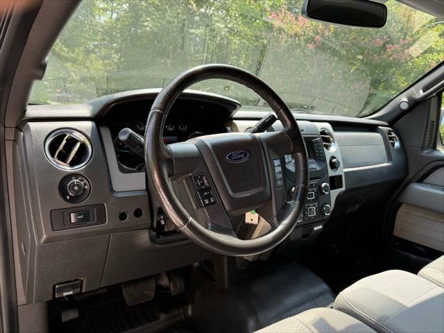 used 2014 Ford F-150 car, priced at $9,999