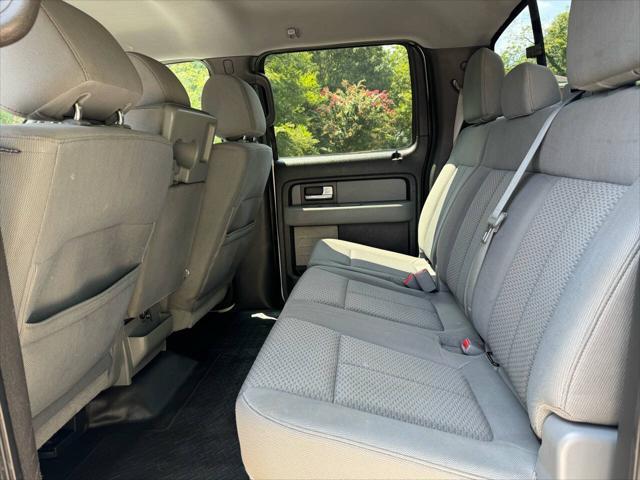 used 2014 Ford F-150 car, priced at $9,999