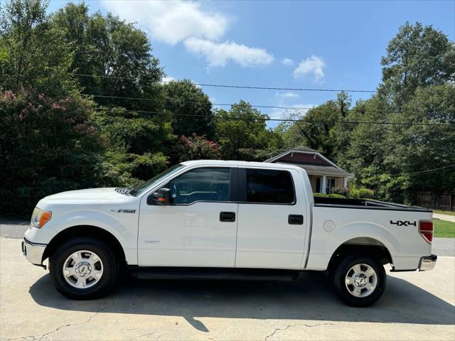 used 2014 Ford F-150 car, priced at $9,999