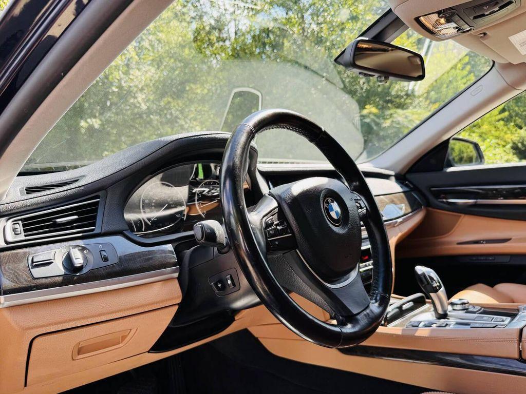 used 2013 BMW 750 car, priced at $7,999