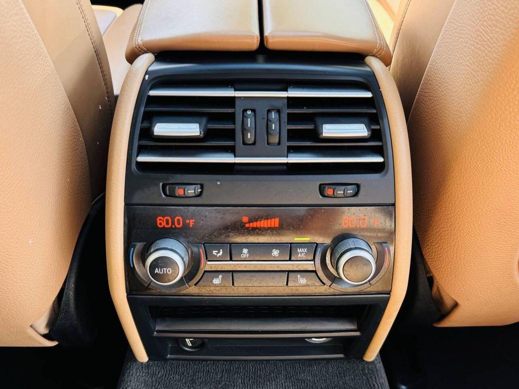 used 2013 BMW 750 car, priced at $7,999