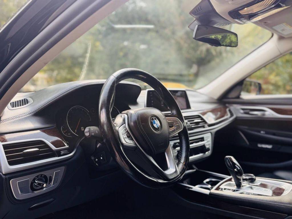 used 2018 BMW 740 car, priced at $16,250