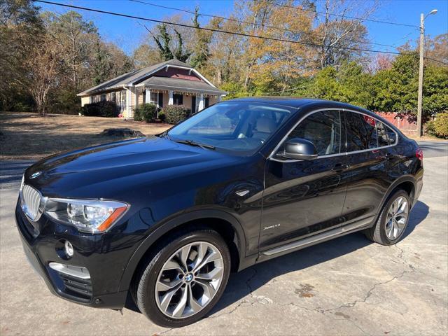 used 2016 BMW X4 car, priced at $14,999