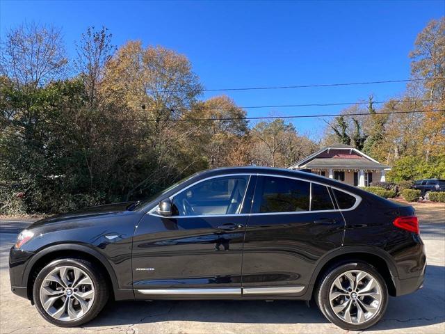 used 2016 BMW X4 car, priced at $14,999