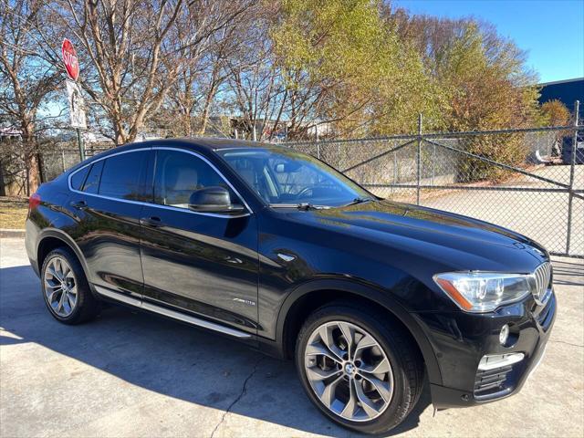 used 2016 BMW X4 car, priced at $14,999