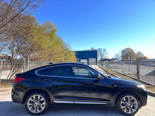 used 2016 BMW X4 car, priced at $14,999