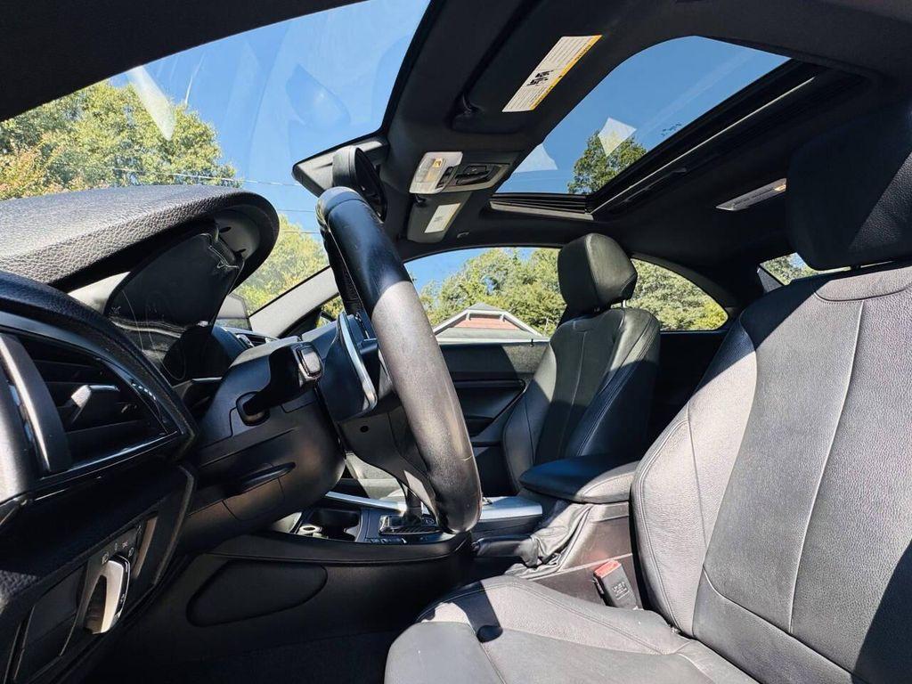 used 2015 BMW 228 car, priced at $8,800