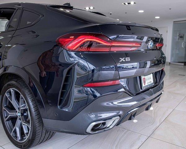 used 2022 BMW X6 car, priced at $57,485