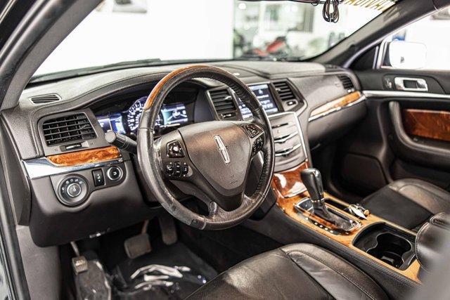 used 2014 Lincoln MKS car, priced at $7,999