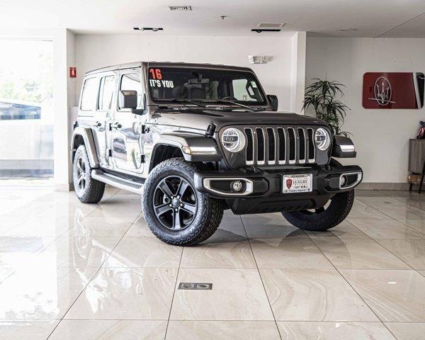 used 2021 Jeep Wrangler Unlimited car, priced at $34,615