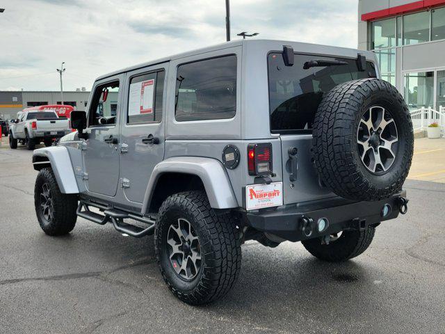 used 2014 Jeep Wrangler Unlimited car, priced at $17,964