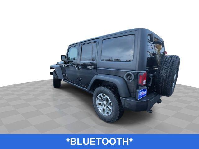 used 2015 Jeep Wrangler Unlimited car, priced at $21,995