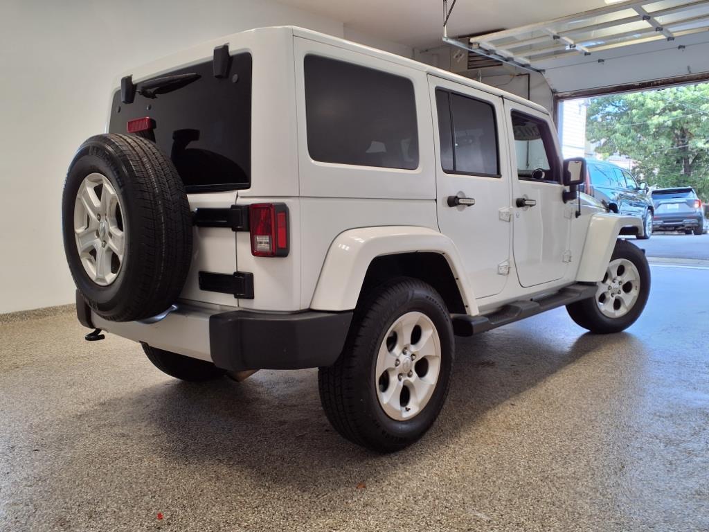 used 2015 Jeep Wrangler Unlimited car, priced at $15,995