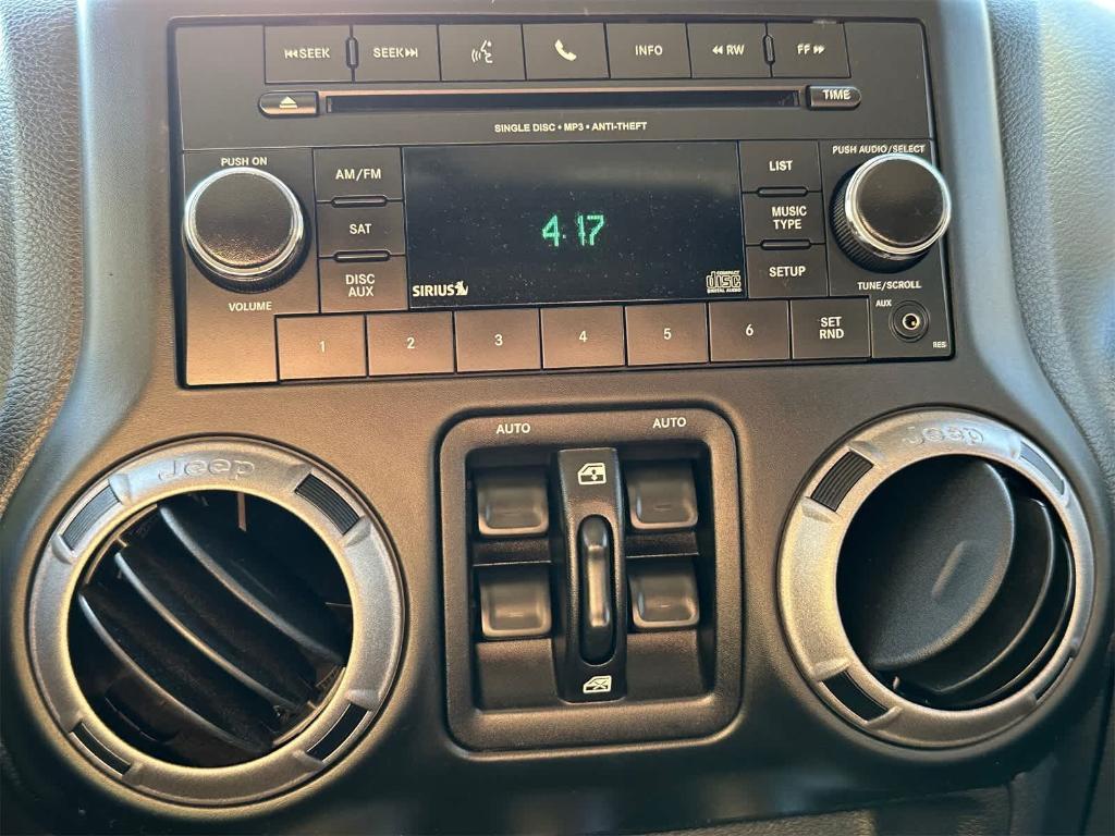 used 2014 Jeep Wrangler Unlimited car, priced at $17,250