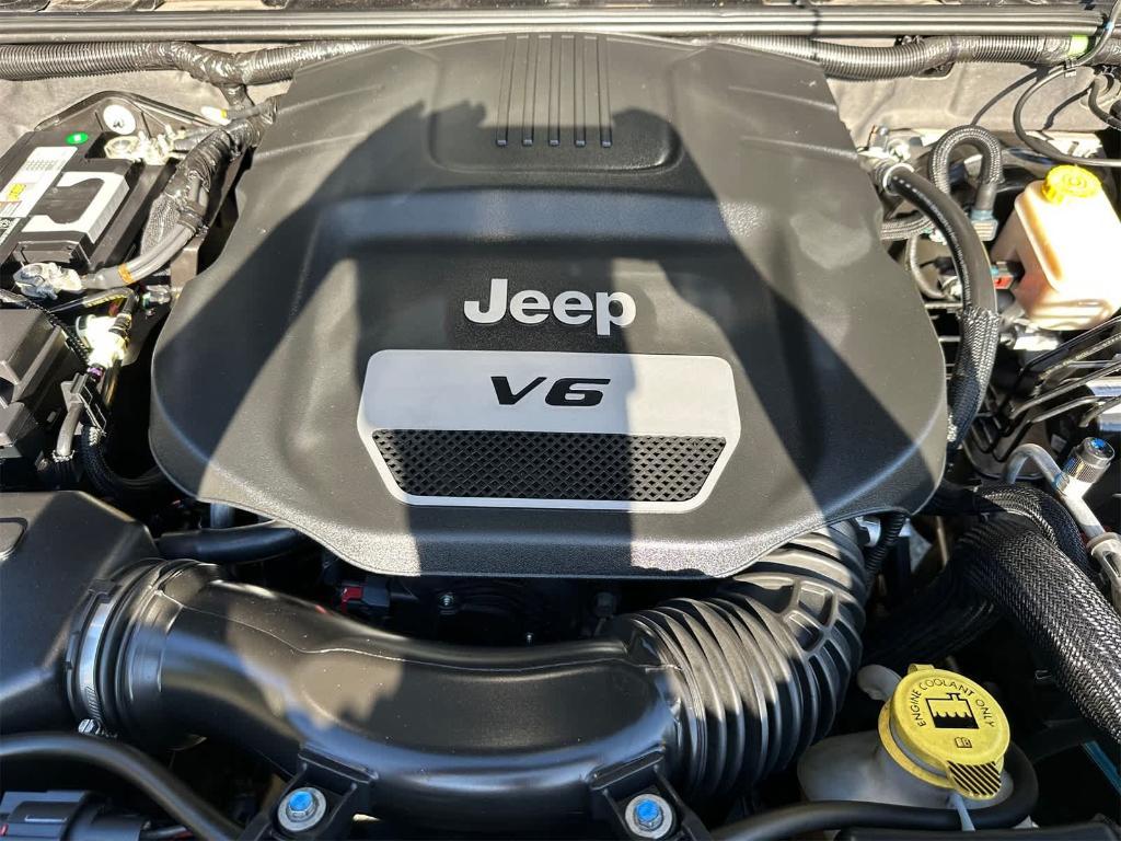 used 2014 Jeep Wrangler Unlimited car, priced at $17,250