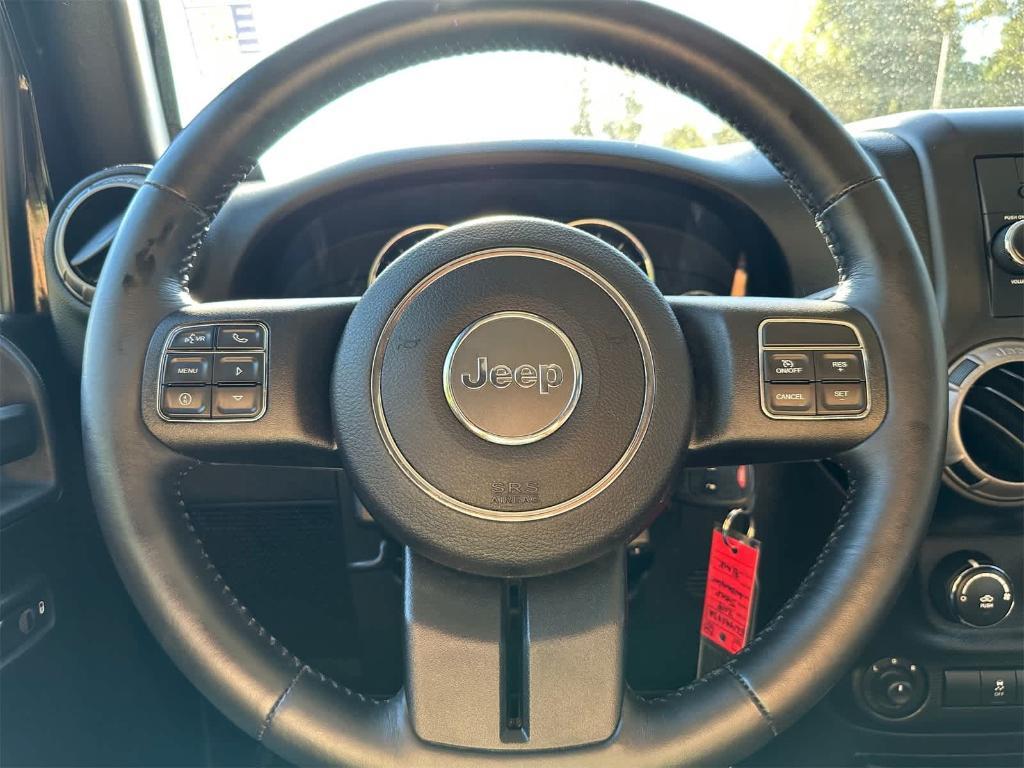 used 2014 Jeep Wrangler Unlimited car, priced at $17,250