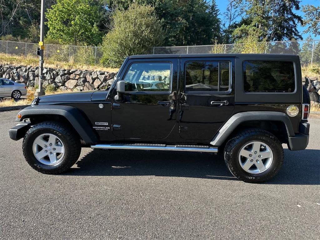 used 2014 Jeep Wrangler Unlimited car, priced at $17,250