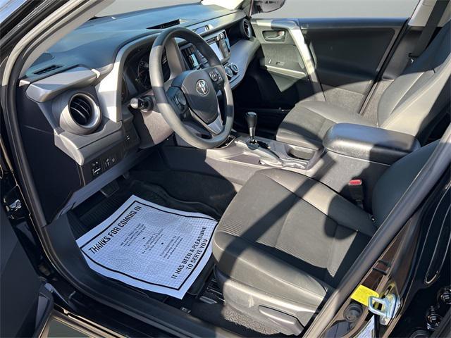used 2018 Toyota RAV4 car, priced at $17,999