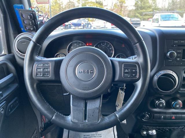 used 2013 Jeep Wrangler Unlimited car, priced at $13,950