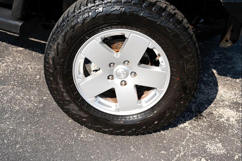 used 2011 Jeep Wrangler Unlimited car, priced at $14,995