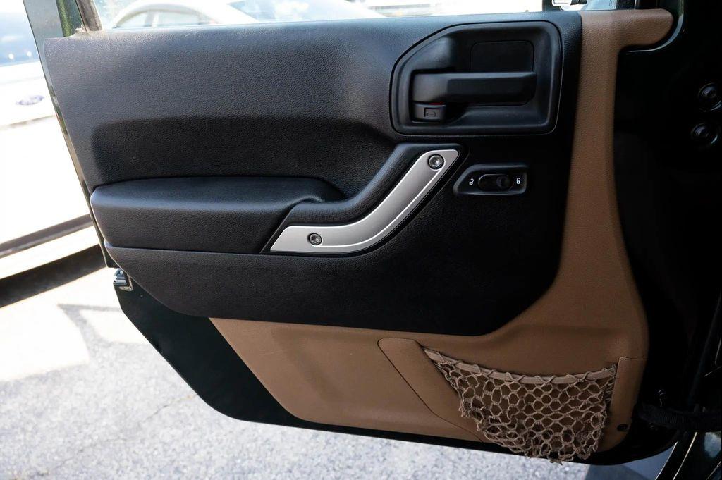 used 2011 Jeep Wrangler Unlimited car, priced at $14,995