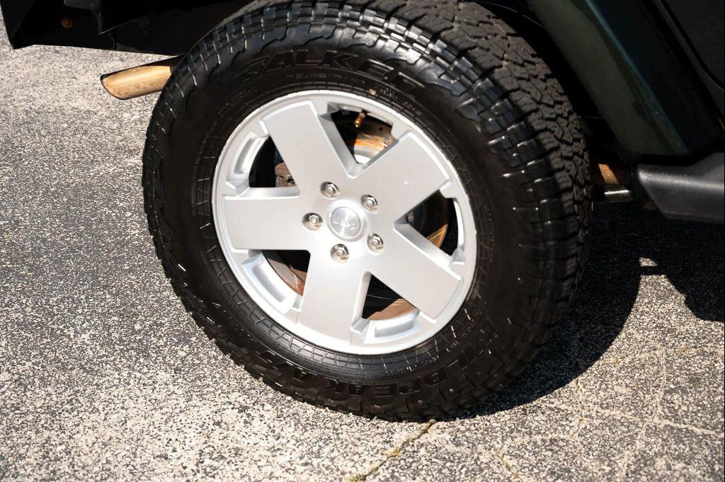 used 2011 Jeep Wrangler Unlimited car, priced at $14,995