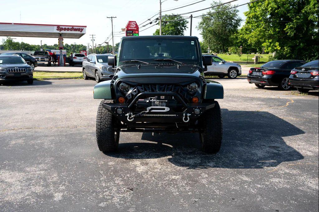 used 2011 Jeep Wrangler Unlimited car, priced at $14,995