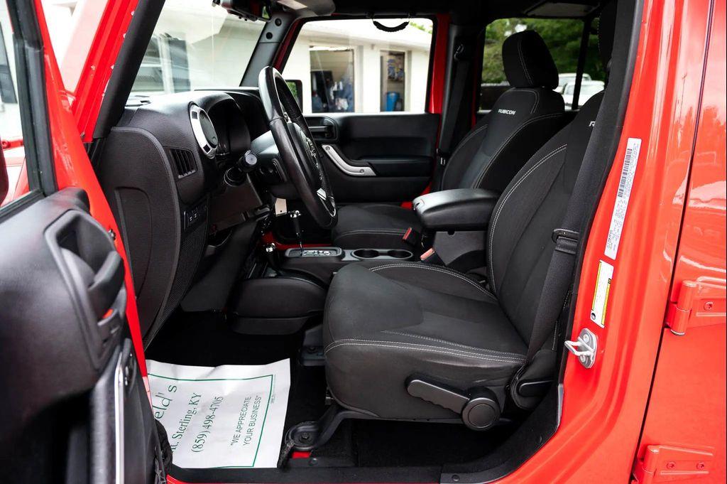 used 2015 Jeep Wrangler Unlimited car, priced at $23,495