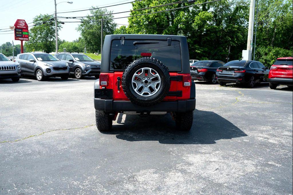 used 2015 Jeep Wrangler Unlimited car, priced at $23,495