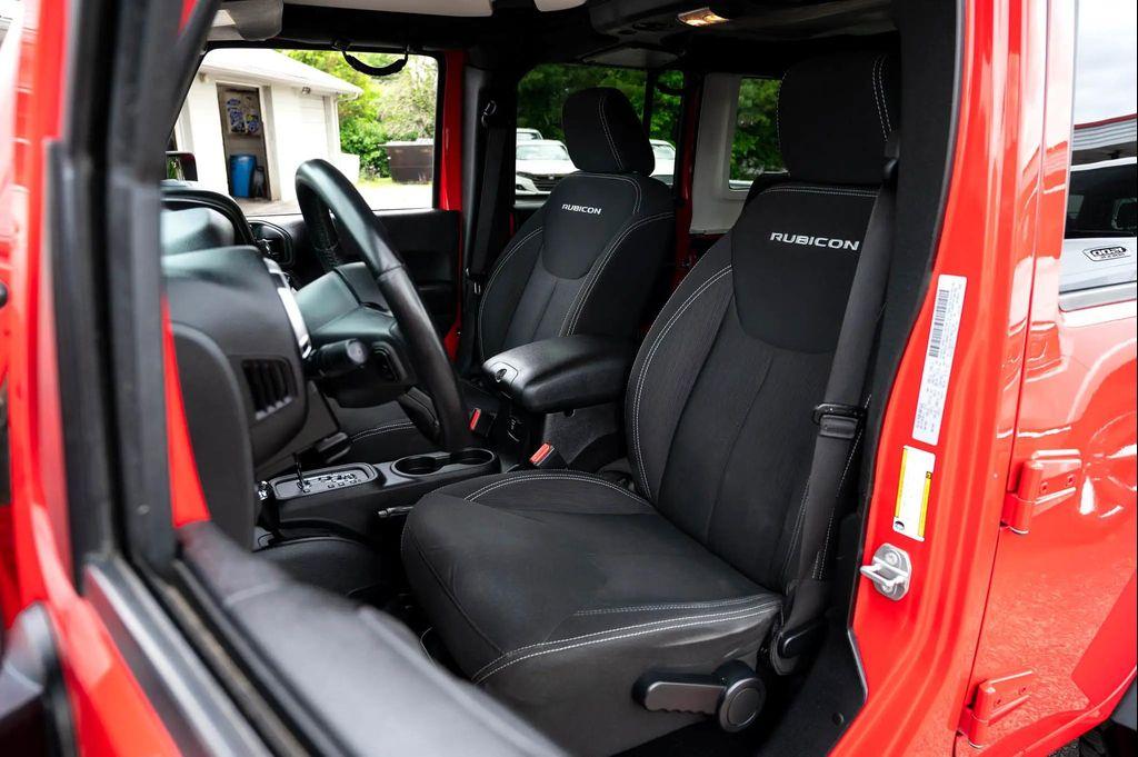 used 2015 Jeep Wrangler Unlimited car, priced at $23,495