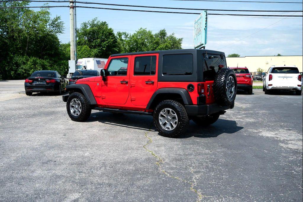 used 2015 Jeep Wrangler Unlimited car, priced at $23,495