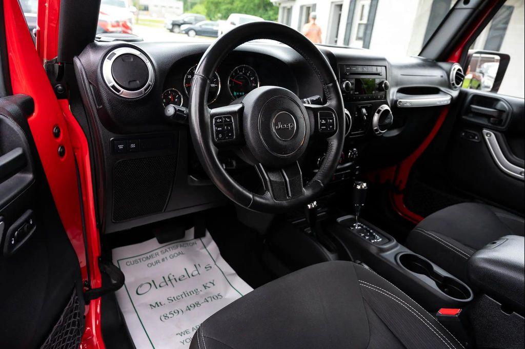 used 2015 Jeep Wrangler Unlimited car, priced at $23,495