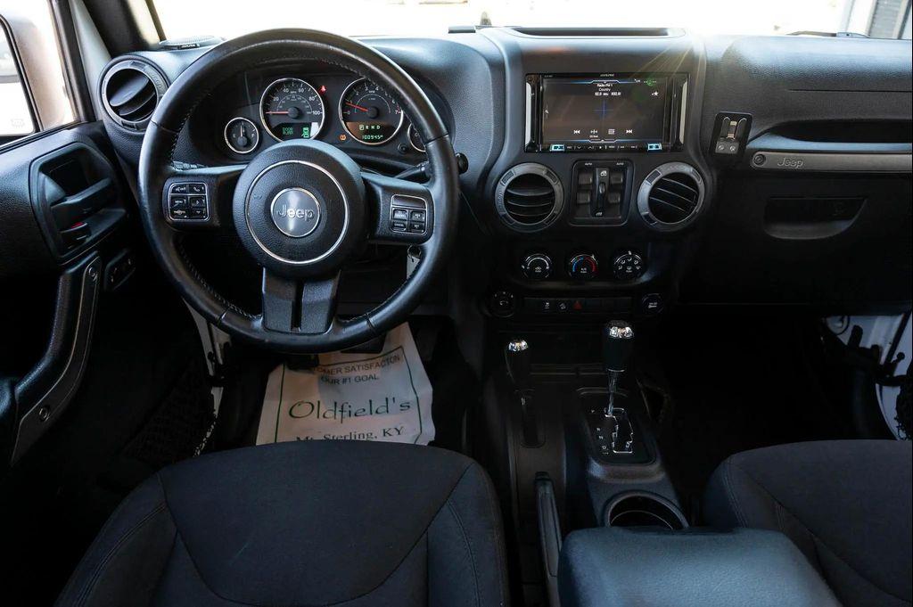 used 2015 Jeep Wrangler Unlimited car, priced at $17,995