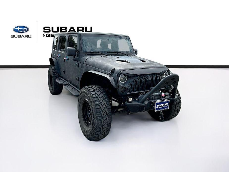 used 2010 Jeep Wrangler Unlimited car, priced at $14,451