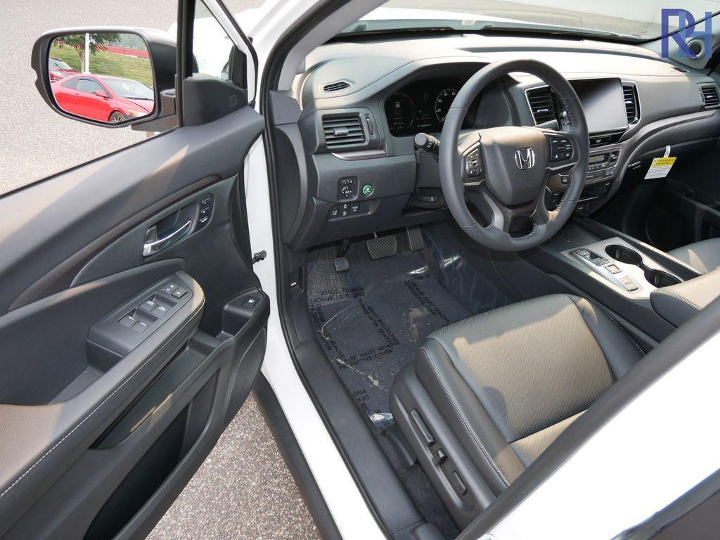 used 2025 Honda Ridgeline car, priced at $38,651
