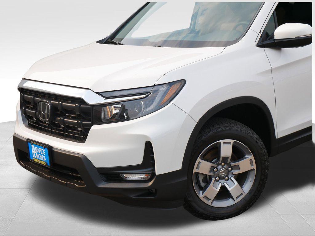 used 2025 Honda Ridgeline car, priced at $38,256