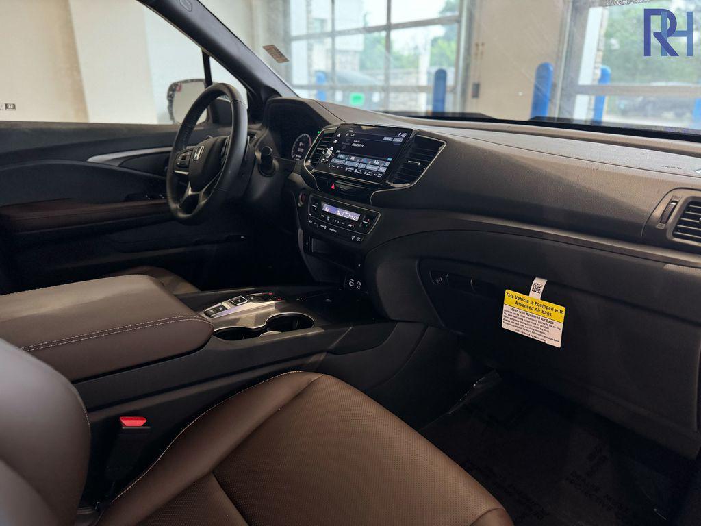 used 2025 Honda Ridgeline car, priced at $38,561