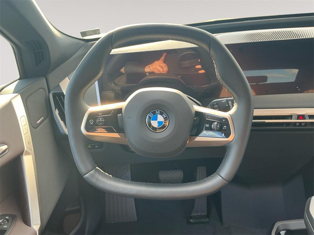 new 2026 BMW iX car, priced at $98,670
