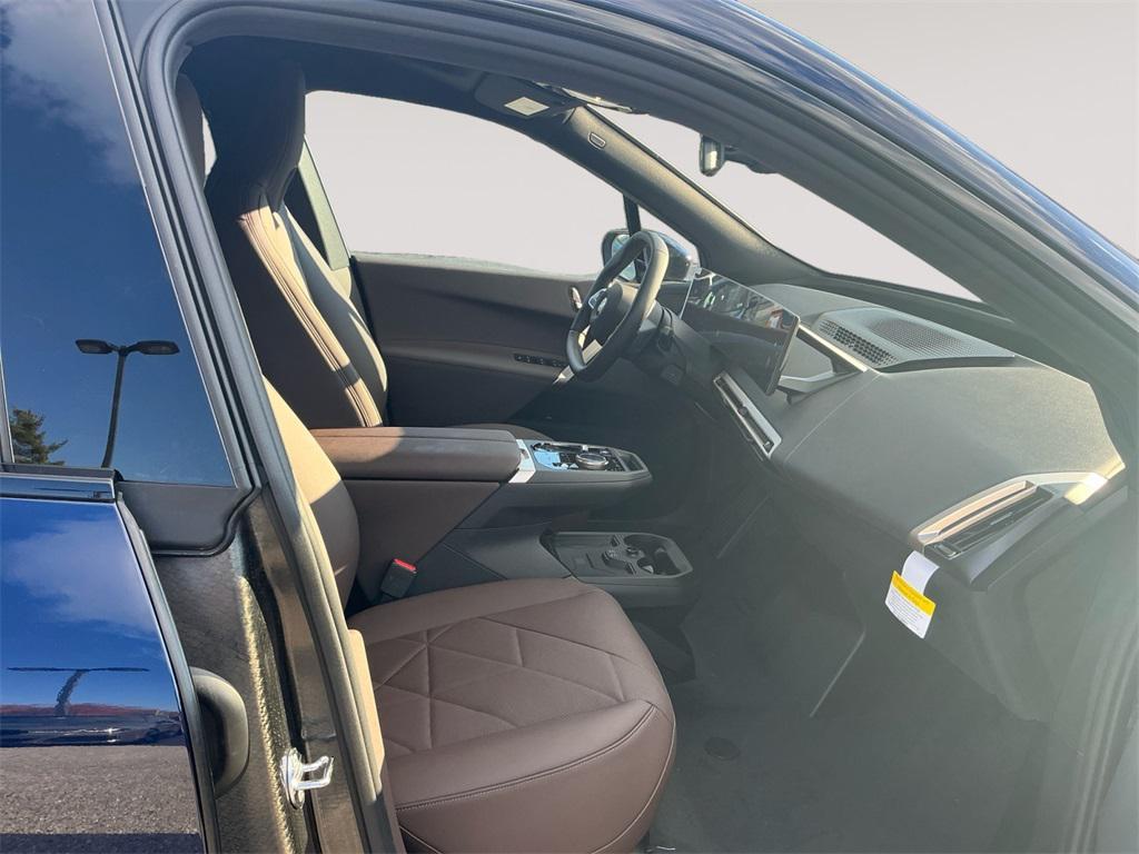 new 2026 BMW iX car, priced at $98,670