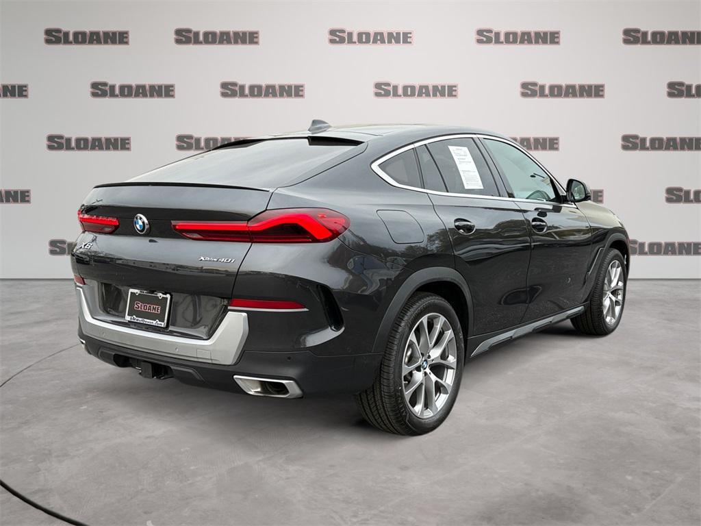 used 2023 BMW X6 car, priced at $56,583
