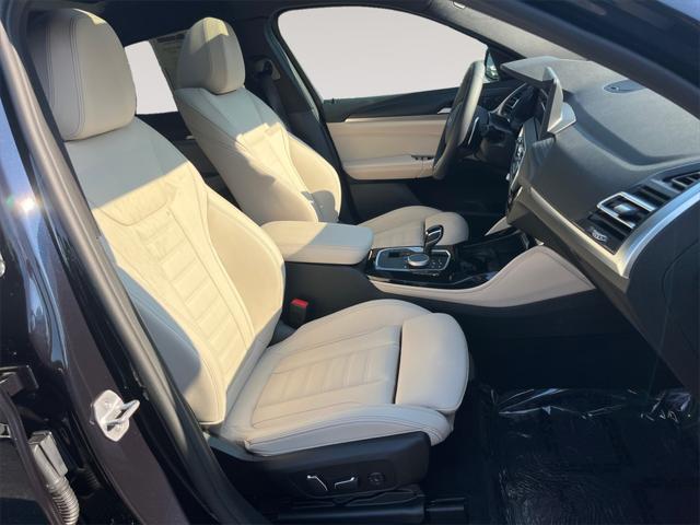 used 2025 BMW X4 car, priced at $60,891
