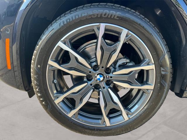 used 2025 BMW X4 car, priced at $60,891
