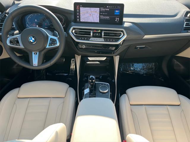 used 2025 BMW X4 car, priced at $60,891