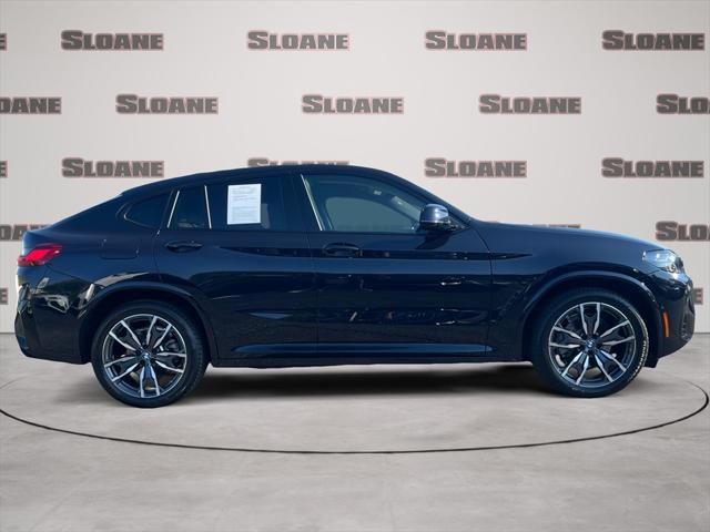 used 2025 BMW X4 car, priced at $60,891