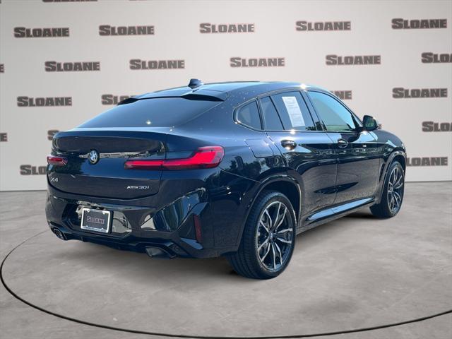used 2025 BMW X4 car, priced at $60,891